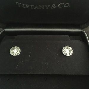 Authentic Tiffany diamond earrings.
